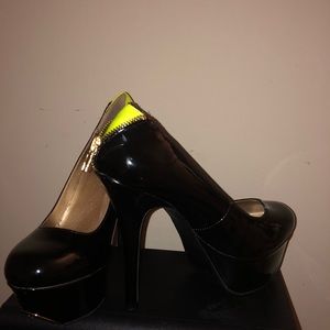 Neon green and black and gold front heels.